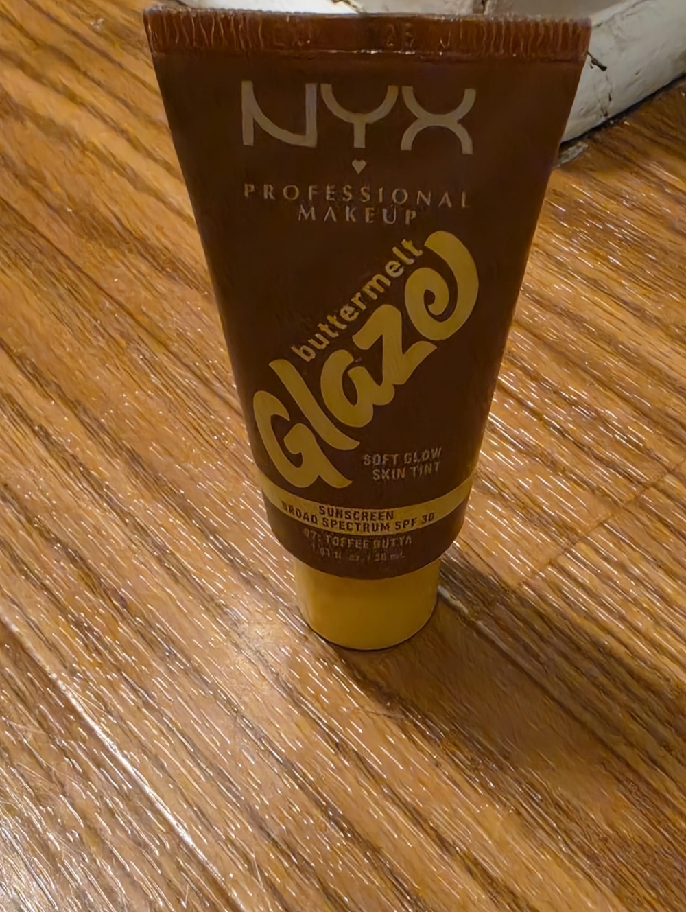 NYX Buttermelt Glaze Soft Glow Skin Tint - Brown and Yellow